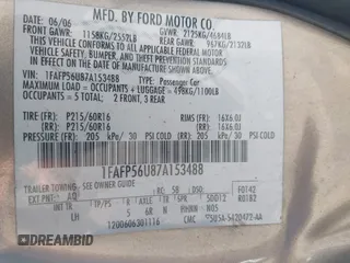 2007 Ford Taurus SEL with VIN 1FAFP56U87A153488, listed as a IAAI auction lot 41874575 with 182,451 mi miles and . Bid and sale history available at DreamBid. Image 9.