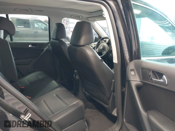 2012 Volkswagen Tiguan SE with VIN WVGBV7AX2CW503301, listed as a IAAI auction lot 42679407 with 90,603 mi miles and . Bid and sale history available at DreamBid. Image 8.