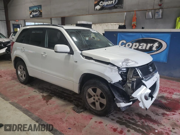 2006 Suzuki Grand Vitara Premium z VIN JS3TD943164101223, wystawiony jako Copart lot #43979705 z przebiegiem 147 813 mil mil oraz Czysty tytuł • Clean title. Historia ofert i sprzedaży dostępna na DreamBid. Obrazek 4.