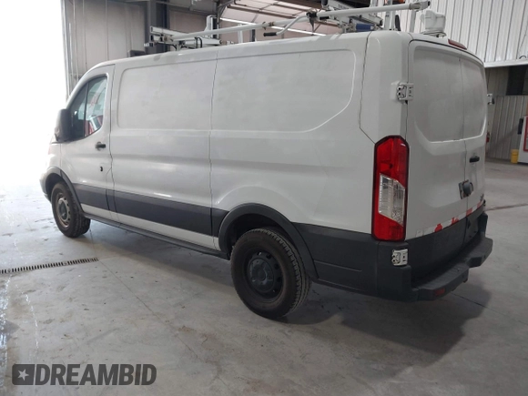 2015 Ford Transit Cargo with VIN 1FTNR1ZM2FKA55134, listed as a IAAI auction lot 42193601 with 96,231 mi miles and . Bid and sale history available at DreamBid. Image 3.