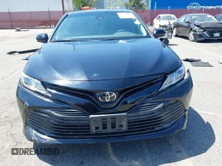 2020 Toyota Camry LE with VIN 4T1C11AKXLU955851, listed as a IAAI auction lot 41996827 with 59,008 mi miles and . Bid and sale history available at carsss.com. Image 6.