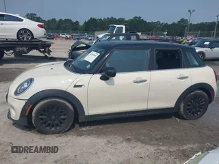 2020 MINI Hardtop 4 Door Cooper with VIN WMWXU7C01L2M54710, listed as a IAAI auction lot 42385956 with 55,714 mi miles and . Bid and sale history available at DreamBid. Image 14.