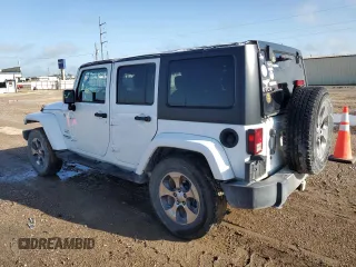 2016 Jeep Wrangler Unlimited Sahara with VIN 1C4BJWEG6GL301301, listed as a Copart auction lot 54362595 with 110,295 mi miles and Salvage title. Bid and sale history available at DreamBid. Image 2.