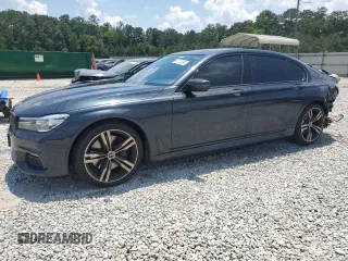 2018 BMW 7 Series 740i с VIN WBA7E2C57JG742517, выставлен на аукционе Copart как лот 61773395 с пробегом 58 813 миль миль и Списание • Salvage title. История ставок и продаж доступна на DreamBid. Изображение 1.