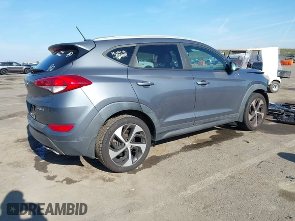 2016 Hyundai Tucson Limited with VIN KM8J33A22GU231834, listed as a IAAI auction lot 41312526 with 117,423 mi miles. Bid and sale history available at carsss.com. Image 4.