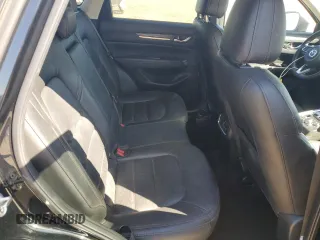 2018 Mazda CX-5 Grand Touring с VIN JM3KFADM2J1310339, выставлен на аукционе Copart как лот 64705245 с пробегом 63 927 миль миль и Списание • Salvage title. История ставок и продаж доступна на DreamBid. Изображение 11.