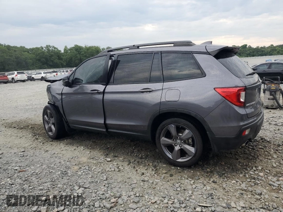 2021 Honda Passport Touring z VIN 5FNYF7H94MB005741, wystawiony jako Copart lot #57626664 z przebiegiem Nie podano mil oraz Szkoda całkowita • Salvage title. Historia ofert i sprzedaży dostępna na DreamBid. Obrazek 2.