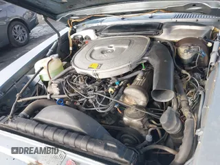 1985 Mercedes-Benz 380 z VIN WDBBA45C5FA029222, wystawiony jako IAAI lot #41658132 z przebiegiem 129 548 mil mil oraz . Historia ofert i sprzedaży dostępna na DreamBid. Obrazek 10.