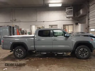 2021 Toyota Tacoma 4WD SR5 with VIN 3TMDZ5BNXMM111204, listed as a IAAI auction lot 41308159 with 46,024 mi miles. Bid and sale history available at carsss.com. Image 13.