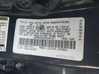 2004 Toyota Corolla CE with VIN 1NXBR32E34Z282167, listed as a IAAI auction lot 41832630 with 174,061 mi miles. Bid and sale history available at carsss.com. Image 9.