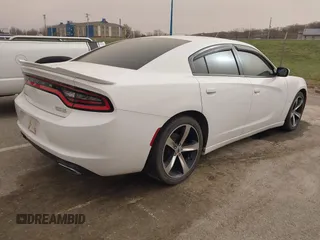 2017 Dodge Charger SE with VIN 2C3CDXBG1HH581654, listed as a IAAI auction lot 41836747 with 124,037 mi miles and . Bid and sale history available at carsss.com. Image 4.