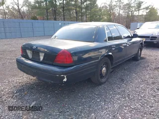 2006 Ford Police Interceptor z VIN 2FAHP71W86X156281, wystawiony jako IAAI lot #41751681 z przebiegiem 125 664 mil mil oraz . Historia ofert i sprzedaży dostępna na DreamBid. Obrazek 4.