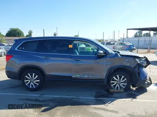 2020 Honda Pilot EX-L with VIN 5FNYF5H51LB020830, listed as a IAAI auction lot 42255746 with 60,503 mi miles and . Bid and sale history available at DreamBid. Image 14.