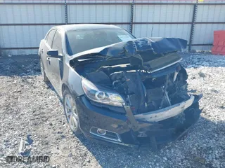 2013 Chevrolet Malibu LTZ with VIN 1G11H5SA6DF217077, listed as a IAAI auction lot 41779449 with 150,412 mi miles. Bid and sale history available at carsss.com. Image 1.