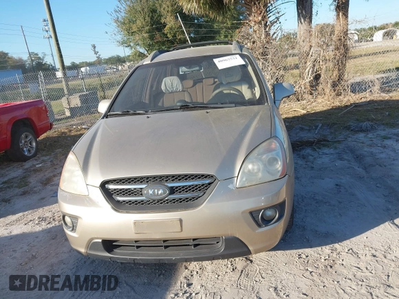 2007 Kia Rondo LX with VIN KNAFG526977114033, listed as a IAAI auction lot 40967531 with 126,761 mi miles. Bid and sale history available at carsss.com. Image 6.