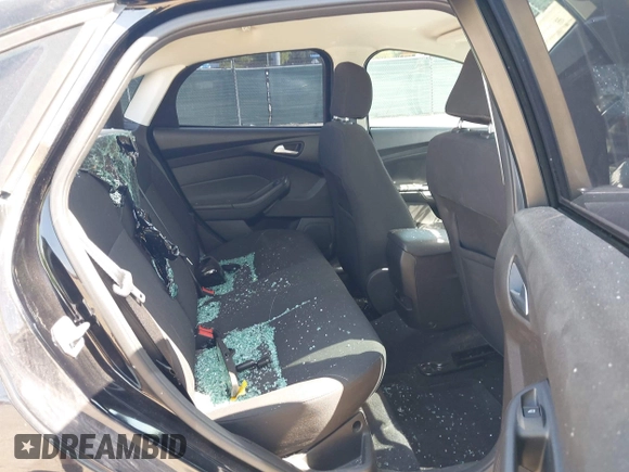 2016 Ford Focus SE with VIN 1FADP3F28GL349817, listed as a IAAI auction lot 42016215 with 68,816 mi miles and . Bid and sale history available at DreamBid. Image 8.