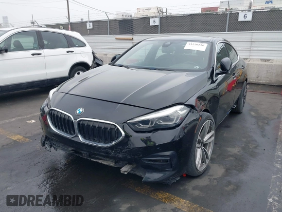 2021 BMW 2 Series 228i xDrive with VIN WBA73AK0XM7H43867, listed as a IAAI auction lot 41226556 with 30,767 mi miles and . Bid and sale history available at DreamBid. Image 6.