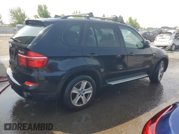 2012 BMW X5 35d with VIN 5UXZW0C54CL670228, listed as a Copart auction lot 53079785 with 144,905 mi miles and Clean title. Bid and sale history available at DreamBid. Image 3.