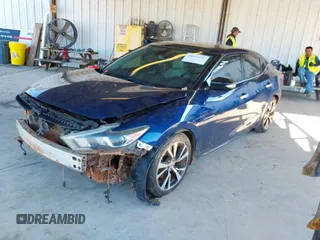 2018 Nissan Maxima SV with VIN 1N4AA6AP1JC400896, listed as a IAAI auction lot 41093576 with 139,089 mi miles and . Bid and sale history available at DreamBid. Image 2.