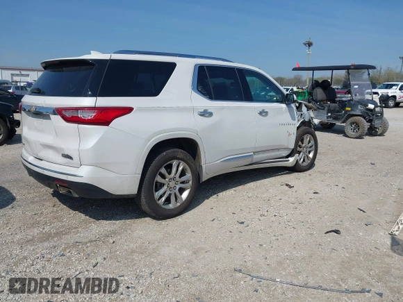 2018 Chevrolet Traverse High Country with VIN 1GNEVKKW9JJ111962, listed as a IAAI auction lot 42118324 with 104,311 mi miles and . Bid and sale history available at DreamBid. Image 4.
