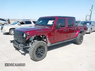 2021 Jeep Gladiator Willys z VIN 1C6HJTAG0ML536455, wystawiony jako IAAI lot #41702393 z przebiegiem 90 644 mil mil oraz . Historia ofert i sprzedaży dostępna na DreamBid. Obrazek 17.