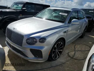 2021 Bentley Bentayga V8 z VIN SJAAM2ZV4MC034001, wystawiony jako Copart lot #78093424 z przebiegiem Nie podano mil oraz Szkoda całkowita • Salvage title. Historia ofert i sprzedaży dostępna na DreamBid. Obrazek 1.