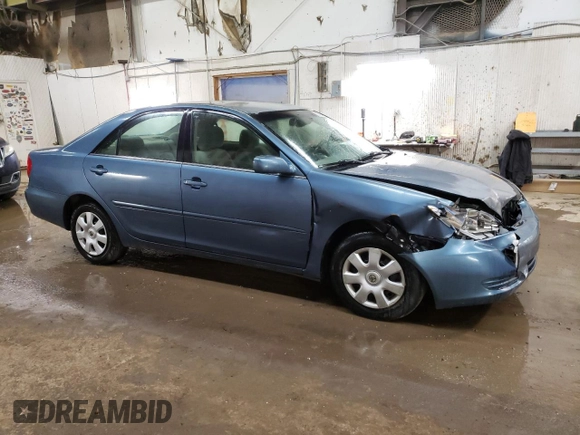 2004 Toyota Camry LE with VIN 4T1BE32K64U812388, listed as a Copart auction lot 82777563 with 209,219 mi miles and Clean Title. Bid and sale history available at carsss.com. Image 4.