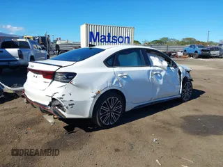 2024 Kia Forte GT with VIN 3KPF44AC6RE743927, listed as a IAAI auction lot 40971782 with 8,942 mi miles. Bid and sale history available at carsss.com. Image 4.
