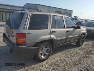 1998 Jeep Grand Cherokee Laredo with VIN 1J4GZ58S8WC301754, listed as a Copart auction lot 69698144 with 205,739 mi miles and Non Repairable. Bid and sale history available at carsss.com. Image 3.