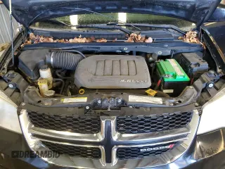 2012 Dodge Grand Caravan SXT with VIN 2C4RDGCG0CR340868, listed as a Copart auction lot 85560274 with 242,089 mi miles and Clean Title. Bid and sale history available at DreamBid. Image 12.