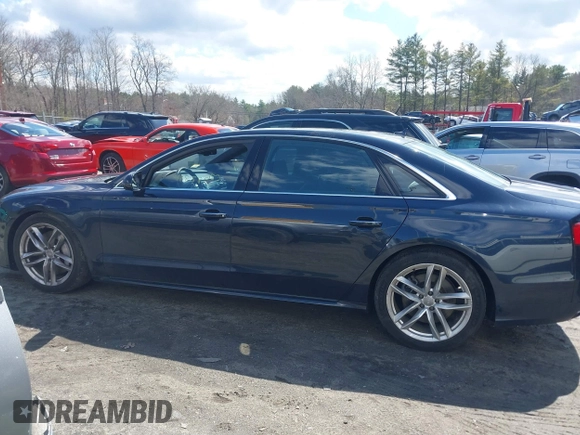 2016 Audi A8 L 4.0T Sport with VIN WAU43AFD1GN022253, listed as a IAAI auction lot 41858053 with 219,517 mi miles. Bid and sale history available at carsss.com. Image 14.