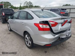2014 Ford Focus SE with VIN 1FADP3F20EL244086, listed as a IAAI auction lot 41878168 with 139,075 mi miles. Bid and sale history available at carsss.com. Image 3.