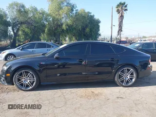 2014 Audi A7 Prestige with VIN WAU2GAFC2EN081411, listed as a IAAI auction lot 41993803 with 66,008 mi miles and . Bid and sale history available at DreamBid. Image 14.