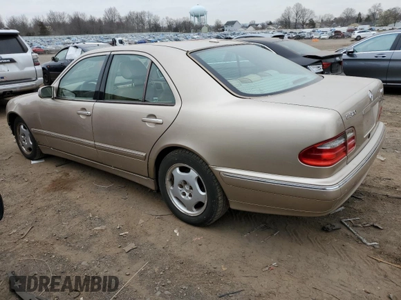 2002 Mercedes-Benz E-Class with VIN WDBJF82J52X062915, listed as a Copart auction lot 48284604 with 150,227 mi miles and Salvage Title. Bid and sale history available at carsss.com. Image 2.