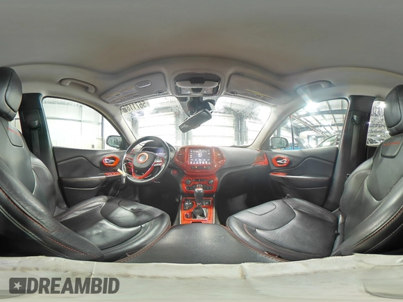 2014 Jeep Cherokee Trailhawk with VIN 1C4PJMBSXEW187981, listed as a Copart auction lot 56711885 with 157,317 mi miles and Salvage title. Bid and sale history available at DreamBid. Image 15.