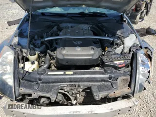 2004 Nissan 350Z Touring z VIN JN1AZ36A94T011081, wystawiony jako Copart lot #57646305 z przebiegiem 130 198 mil mil oraz Szkoda całkowita • Salvage title. Historia ofert i sprzedaży dostępna na DreamBid. Obrazek 11.