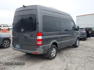 2011 Mercedes-Benz Sprinter Passenger with VIN WDZPE7CC2B5532709, listed as a IAAI auction lot 41192323 with 168,000 mi miles. Bid and sale history available at carsss.com. Image 4.