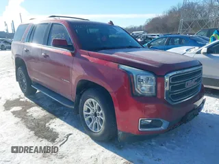 2015 GMC Yukon SLE with VIN 1GKS2AKC2FR514005, listed as a IAAI auction lot 41292783 with 129,413 mi miles. Bid and sale history available at carsss.com. Image 1.
