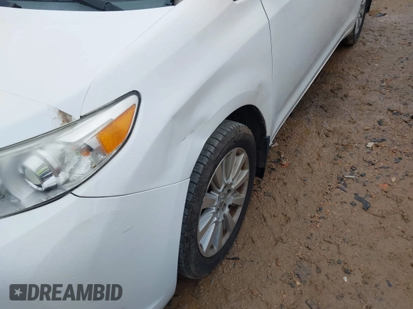 2012 Toyota Sienna LE with VIN 5TDJK3DC3CS048579, listed as a IAAI auction lot 41055074 with 202,791 mi miles. Bid and sale history available at carsss.com. Image 6.