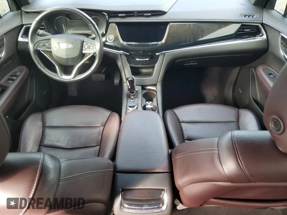 2021 Cadillac XT6 Premium Luxury z VIN 1GYKPCRSXMZ230618, wystawiony jako Copart lot #81022824 z przebiegiem Nie podano mil oraz Szkoda całkowita • Salvage title. Historia ofert i sprzedaży dostępna na DreamBid. Obrazek 8.