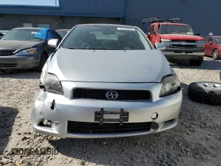 2009 Scion tC z VIN JTKDE167590296040, wystawiony jako Copart lot #58440895 z przebiegiem 171 825 mil mil oraz Szkoda całkowita • Salvage title. Historia ofert i sprzedaży dostępna na DreamBid. Obrazek 5.
