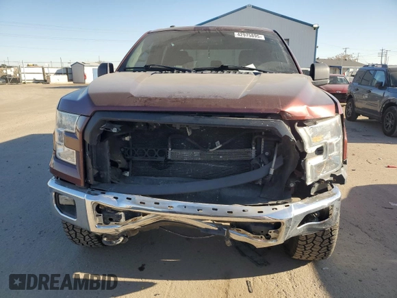2015 Ford F-150 XLT with VIN 1FTEW1E81FKD22779, listed as a Copart auction lot 42975895 with 144,062 mi miles and Salvage Title. Bid and sale history available at carsss.com. Image 5.