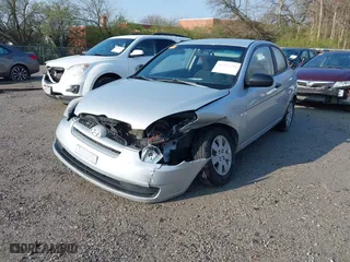 2010 Hyundai Accent GS with VIN KMHCM3AC2AU164786, listed as a IAAI auction lot 41995191 with 148,174 mi miles. Bid and sale history available at carsss.com. Image 2.