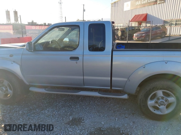 2001 Nissan Frontier SE Desert Runner with VIN 1N6ED26T41C312911, listed as a IAAI auction lot 41382369 with 175,131 mi miles and . Bid and sale history available at DreamBid. Image 14.