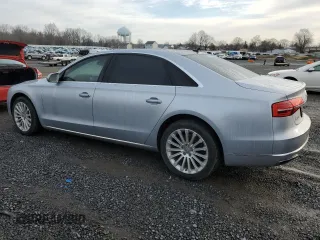 2015 Audi A8 3.0T z VIN WAU3GAFD7FN008548, wystawiony jako Copart lot #50428525 z przebiegiem 128 457 mil mil oraz Czysty tytuł • Clean title. Historia ofert i sprzedaży dostępna na DreamBid. Obrazek 2.