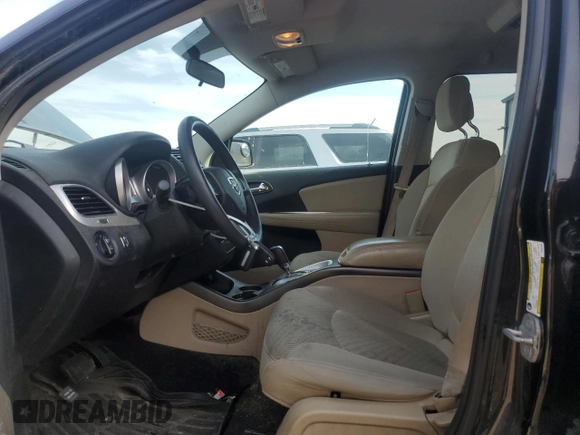 2013 Dodge Journey SXT with VIN 3C4PDCBG8DT601096, listed as a Copart auction lot 56187835 with 142,731 mi miles and Clean Title. Bid and sale history available at DreamBid. Image 7.