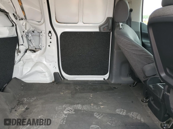 2021 Nissan NV200 SV с VIN 3N6CM0KN8MK700872, выставлен на аукционе Copart как лот 57840275 с пробегом 98 193 миль миль и Списание • Salvage title. История ставок и продаж доступна на DreamBid. Изображение 11.