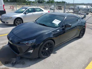2014 Scion FR-S z VIN JF1ZNAA10E8703778, wystawiony jako IAAI lot #42264695 z przebiegiem 117 889 mil mil oraz . Historia ofert i sprzedaży dostępna na DreamBid. Obrazek 18.