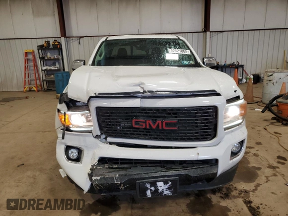 2018 GMC Canyon 4WD Denali z VIN 1GTG6EEN6J1171037, wystawiony jako Copart lot #52521865 z przebiegiem 99 931 mil mil oraz Szkoda całkowita • Salvage title. Historia ofert i sprzedaży dostępna na DreamBid. Obrazek 5.