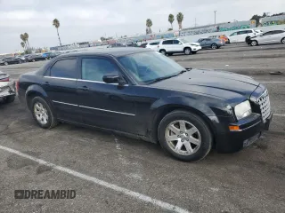 2007 Chrysler 300 Signature with VIN 2C3KA53G57H877394, listed as a Copart auction lot 71302834 with 134,697 mi miles and Salvage Title. Bid and sale history available at carsss.com. Image 4.